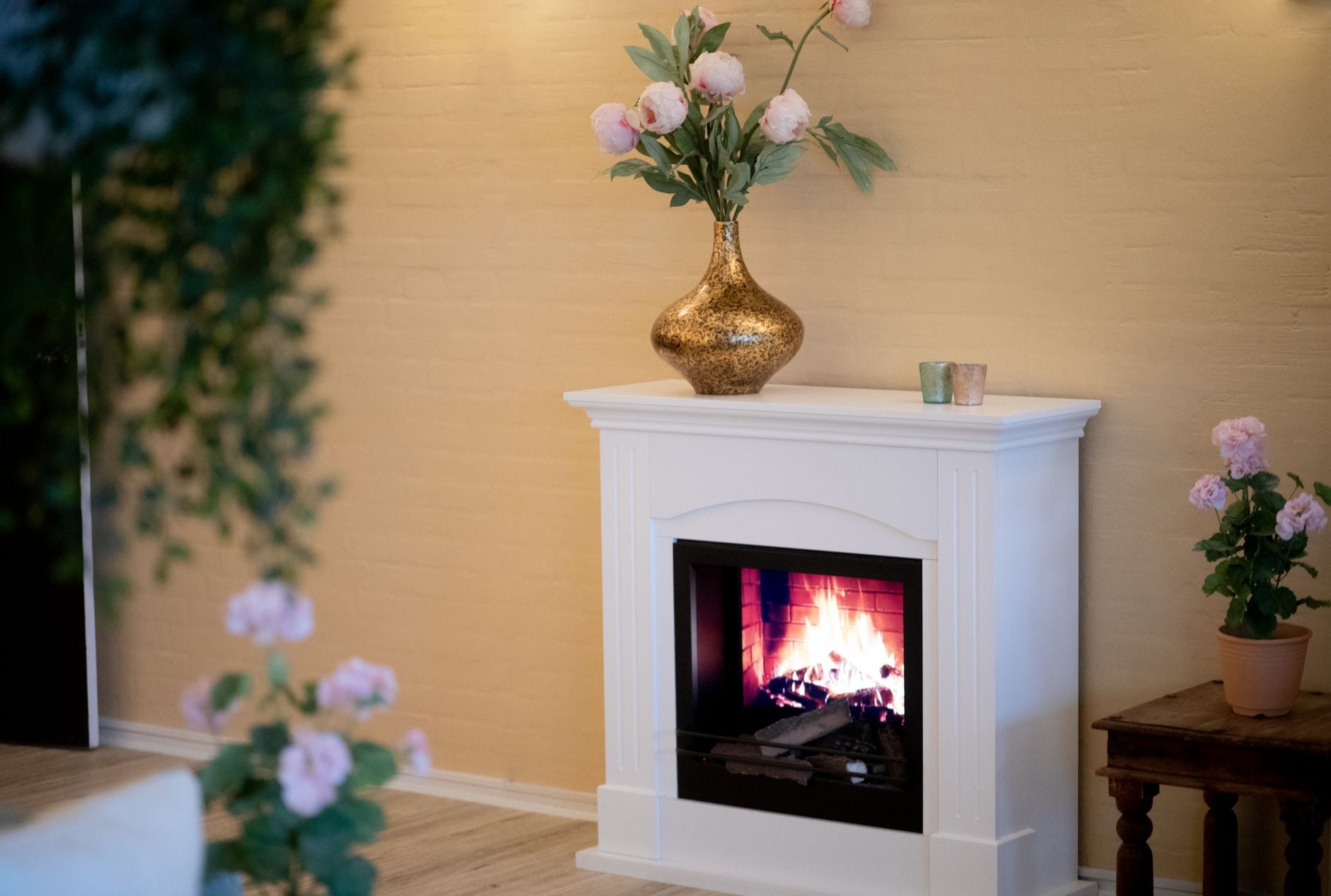 Bright and contemporary living room with a fireplace and stylish decor.